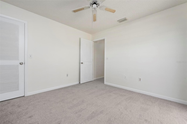 1915 Pebble Beach Ct, Venice, FL 34293 - carpeted spare room with baseboards and a ceiling fan