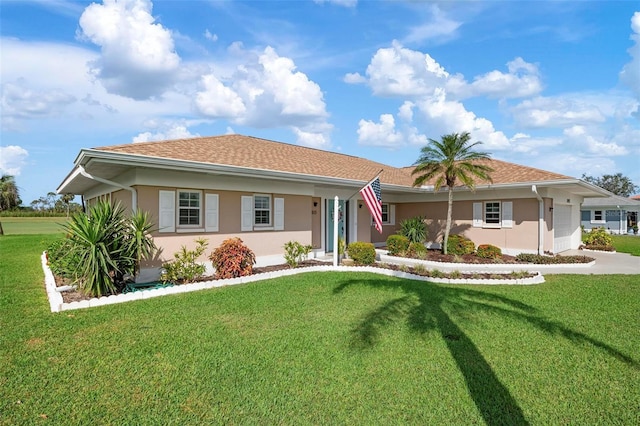 1915 Pebble Beach Ct, Venice, FL 34293 - ranch-style home featuring stucco siding and a front yard