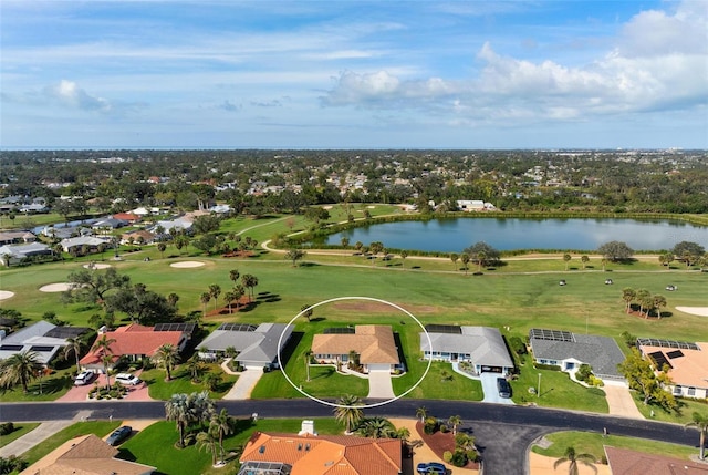 1915 Pebble Beach Ct, Venice, FL 34293 - aerial perspective of suburban area featuring a nearby body of water and a golf club