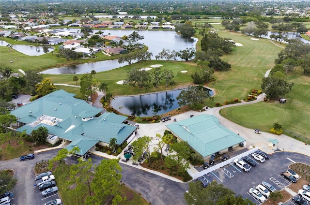 1915 Pebble Beach Ct, Venice, FL 34293 - aerial view of property's location featuring a golf club, a nearby body of water, and nearby suburban area