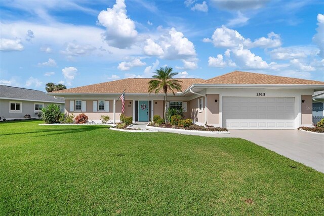 1915 Pebble Beach Ct, Venice, FL 34293 - ranch-style house featuring stucco siding, driveway, an attached garage, and a front lawn