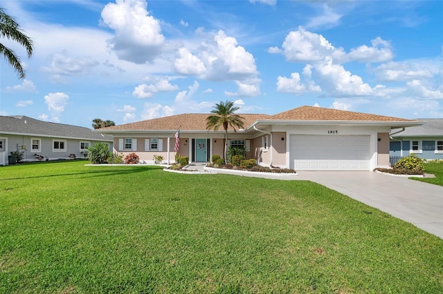 1915 Pebble Beach Ct, Venice, FL 34293 - ranch-style home featuring stucco siding, an attached garage, driveway, and a front yard