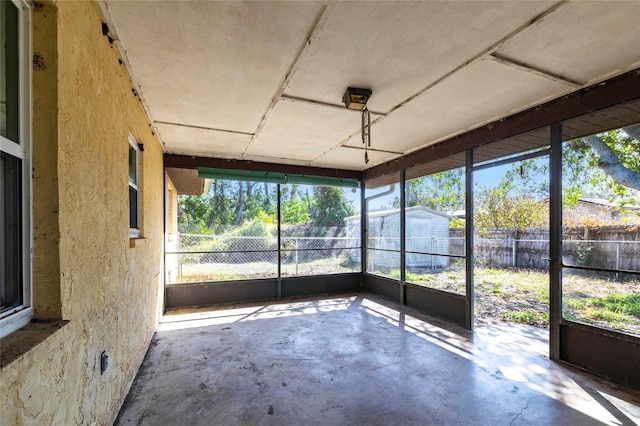 unfurnished sunroom with a wealth of natural light