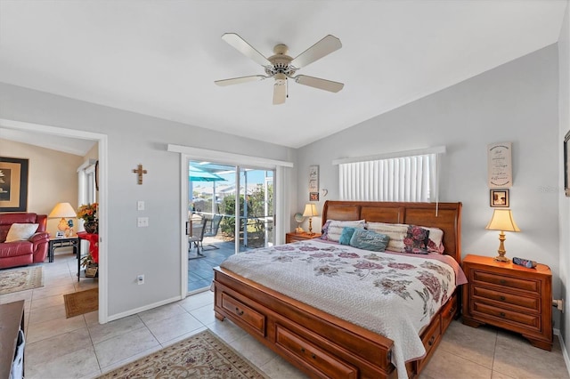 3300 Loveland Blvd Unit 1201, Punta Gorda, FL 33980 - bedroom featuring lofted ceiling, access to outside, baseboards, and light tile patterned flooring