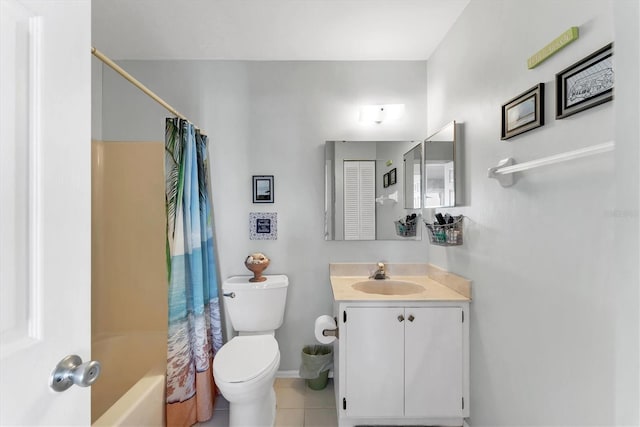 3300 Loveland Blvd Unit 1201, Punta Gorda, FL 33980 - full bathroom featuring shower / bath combo, toilet, tile patterned flooring, vanity, and a closet