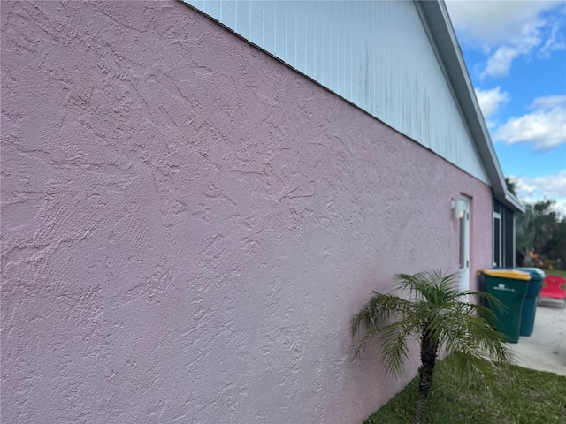 view of home's exterior with stucco siding