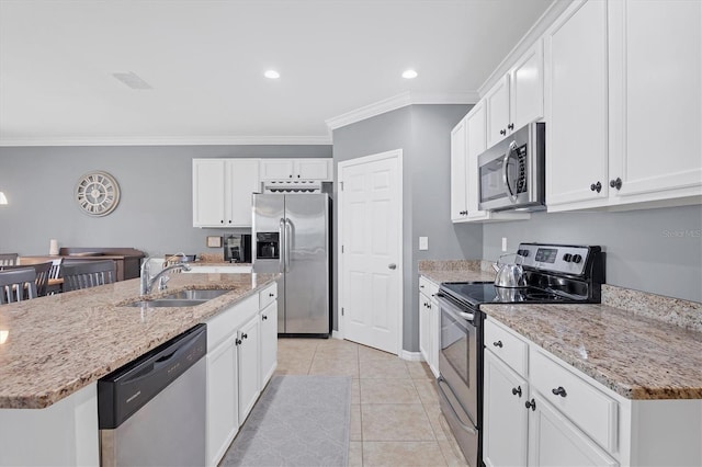 kitchen featuring sink, crown molding, white cabinets, and appliances with stainless steel finishes