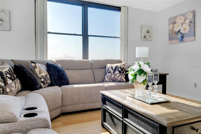 living room with light hardwood / wood-style floors