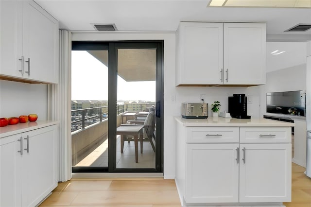 kitchen with white cabinetry