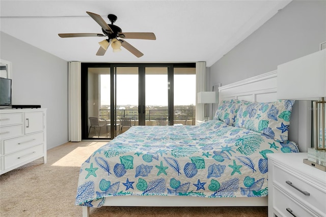 bedroom featuring floor to ceiling windows, light colored carpet, access to exterior, and ceiling fan