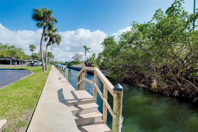 view of dock with a water view