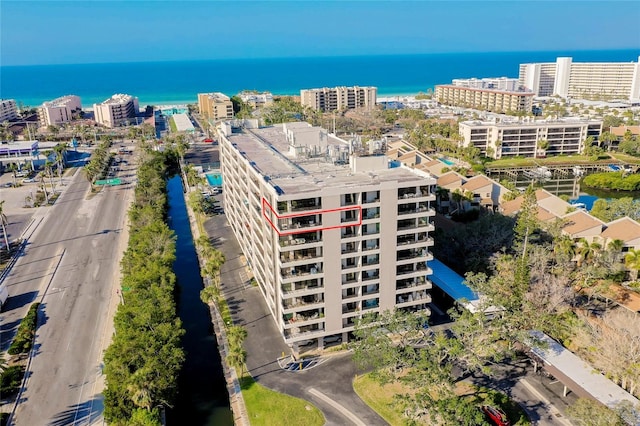 6415 Midnight Pass Rd Unit 909, Sarasota, FL 34242 - drone / aerial view featuring a city view and a water view