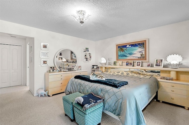 carpeted bedroom with a textured ceiling