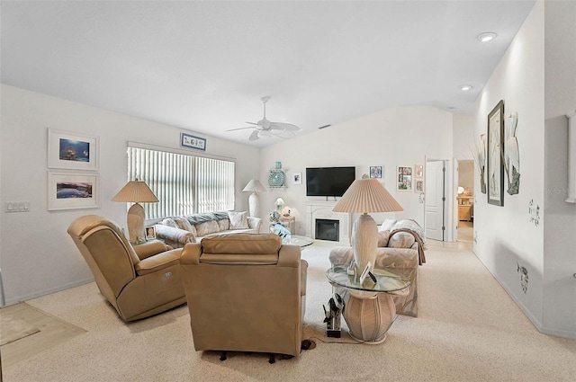 living room with vaulted ceiling and ceiling fan