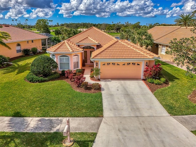 mediterranean / spanish-style house with a garage and a front lawn