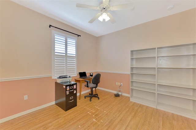 home office with hardwood / wood-style floors and ceiling fan