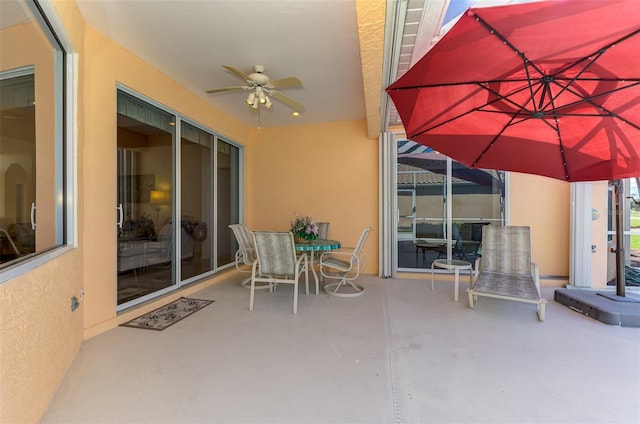 view of patio with ceiling fan