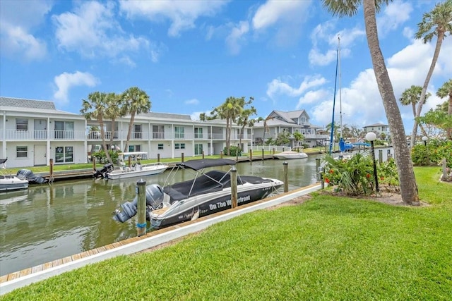 902 Gibbs Rd Unit 181, Venice, FL 34285 - dock area featuring a residential view, a water view, and a yard
