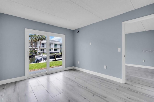 902 Gibbs Rd Unit 181, Venice, FL 34285 - empty room featuring wood finished floors