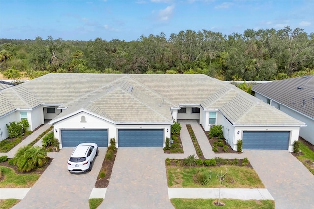 view of front of property with a garage