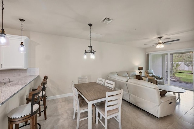 dining area featuring ceiling fan