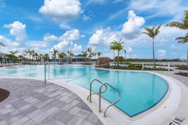 view of pool featuring a patio