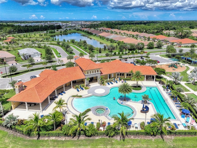 birds eye view of property with a water view