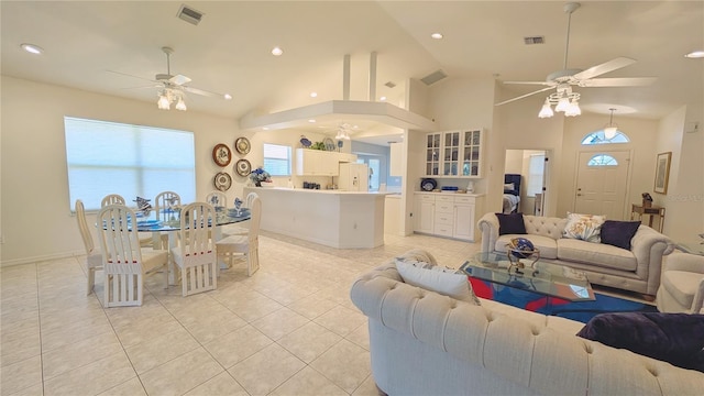 living room with recessed lighting, a ceiling fan, light tile patterned flooring, and visible vents