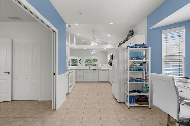 213 Venice Palms Blvd, Venice, FL 34292 - kitchen featuring a ceiling fan, light tile patterned flooring, white appliances, white cabinets, and recessed lighting