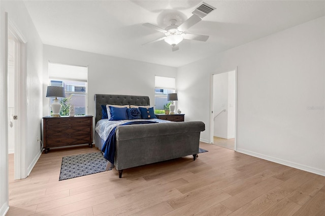 213 Venice Palms Blvd, Venice, FL 34292 - bedroom featuring light wood finished floors, multiple windows, and baseboards