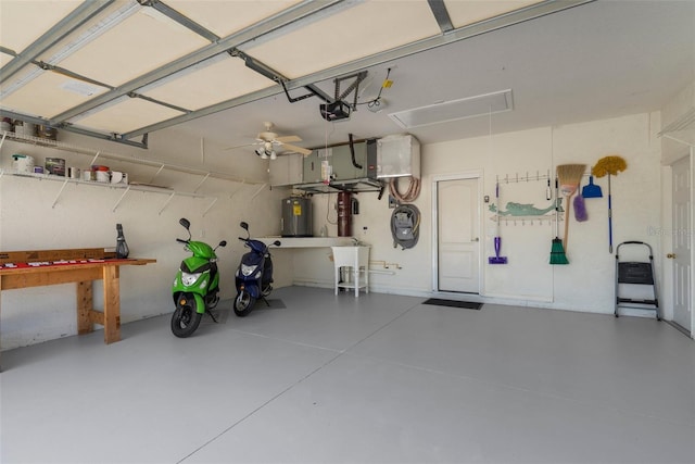 213 Venice Palms Blvd, Venice, FL 34292 - garage featuring water heater and a garage door opener