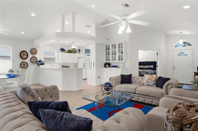 213 Venice Palms Blvd, Venice, FL 34292 - living area with ceiling fan, recessed lighting, light tile patterned floors, high vaulted ceiling, and baseboards