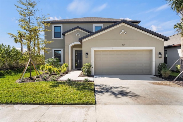 traditional-style house featuring concrete driveway, a front yard, an attached garage, and stucco siding