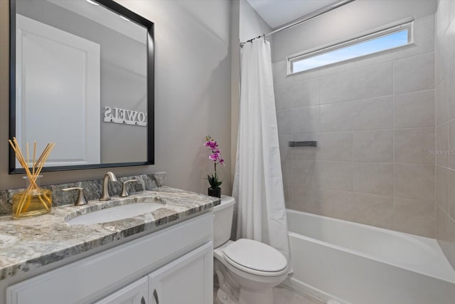 full bath with vanity, shower / bath combination with curtain, and toilet