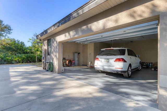 garage with electric water heater