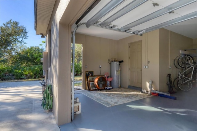 garage featuring electric water heater