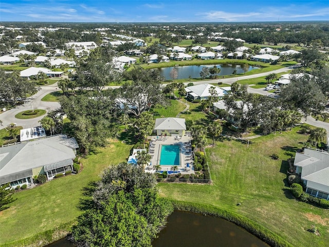 bird's eye view featuring a residential view and a water view