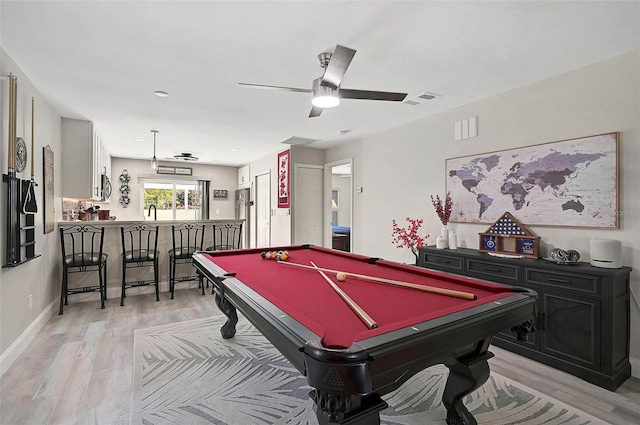 playroom featuring light wood-style flooring, pool table, visible vents, a ceiling fan, and a bar