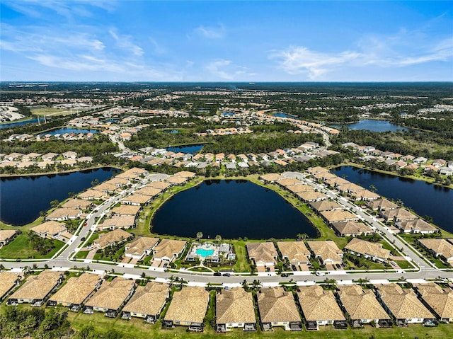 bird's eye view with a water view and a residential view