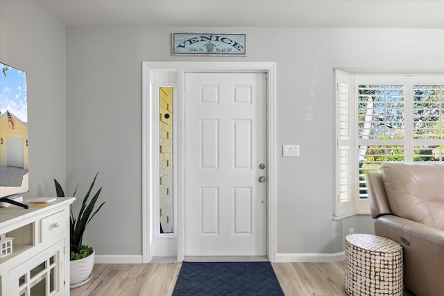 929 The Rialto, Venice, FL 34285 - entrance foyer featuring light wood-type flooring and baseboards