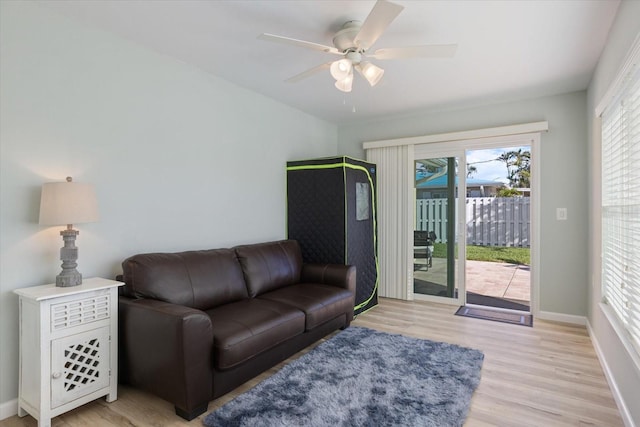 929 The Rialto, Venice, FL 34285 - living area with light wood-style floors, ceiling fan, and baseboards