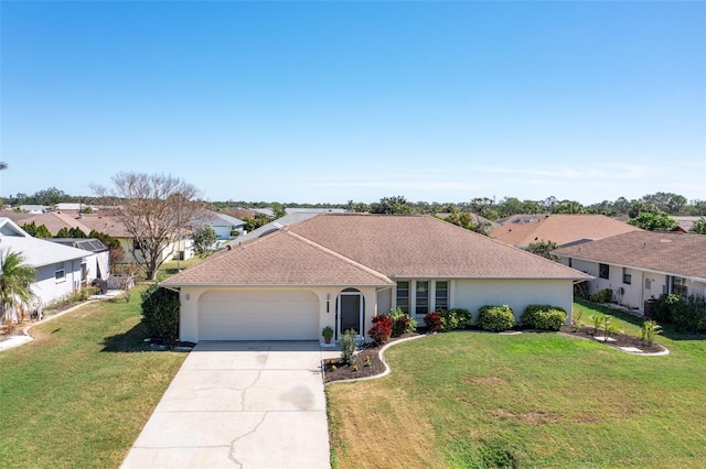 single story home featuring driveway, stucco siding, an attached garage, and a front yard