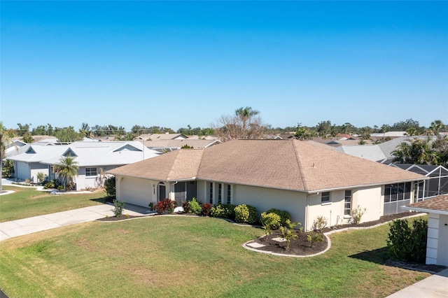 ranch-style house featuring an attached garage, stucco siding, concrete driveway, and a front yard