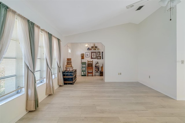 5875 Jackson, Venice, FL 34293 - unfurnished room featuring light wood-style floors, visible vents, vaulted ceiling, and a chandelier