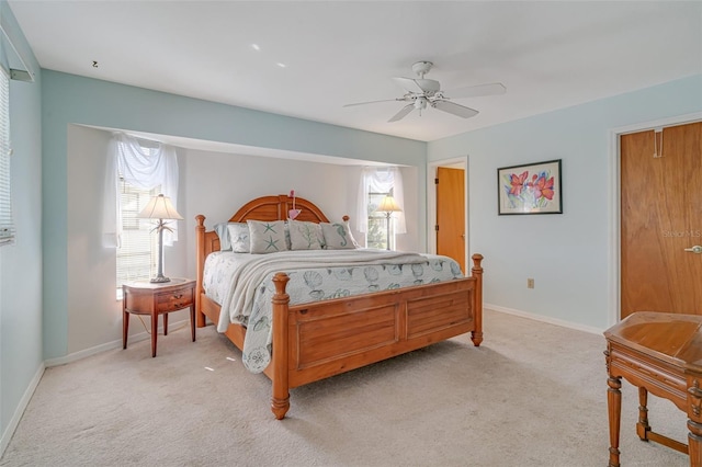 5875 Jackson, Venice, FL 34293 - bedroom featuring a ceiling fan, light carpet, and baseboards