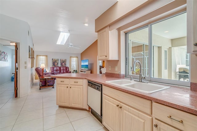 5875 Jackson, Venice, FL 34293 - kitchen with dishwashing machine, open floor plan, a peninsula, light countertops, and a sink