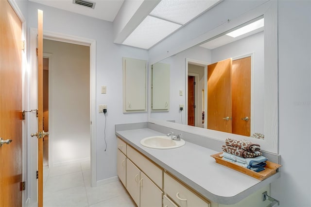 5875 Jackson, Venice, FL 34293 - bathroom featuring vanity, tile patterned flooring, visible vents, and baseboards