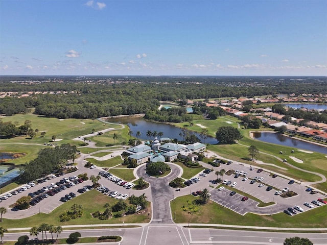 bird's eye view featuring a water view and golf course view