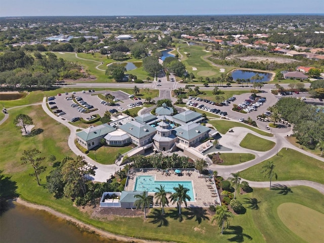 bird's eye view with view of golf course and a water view
