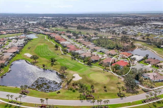 aerial view featuring a residential view, a water view, and golf course view